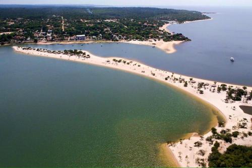 an aerial view of the shores of a beach at Agualinda Hotel in Alter do Chao
