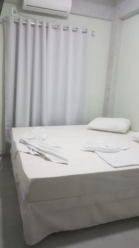 Postel nebo postele na pokoji v ubytování Hotel Mamma Mia