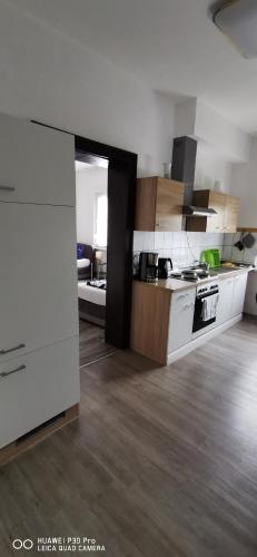 Η κουζίνα ή μικρή κουζίνα στο Monteurwohnung 1 Wolfen