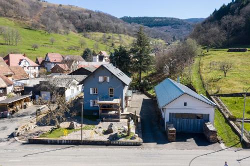 an aerial view of a small town with a house at Locations des 3 sommets avec Sauna et Spa en Alsace in Sondernach