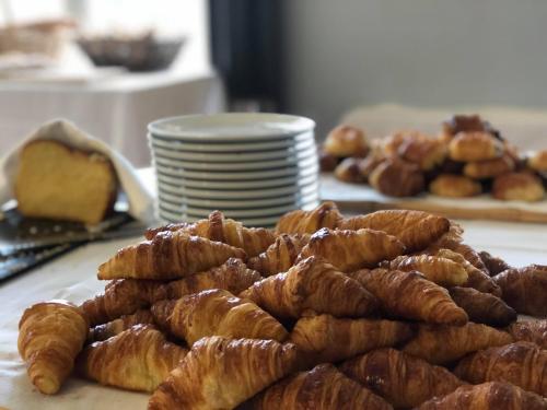 a pile of croissants sitting on top of a table at Le Fregate Provence in Bandol