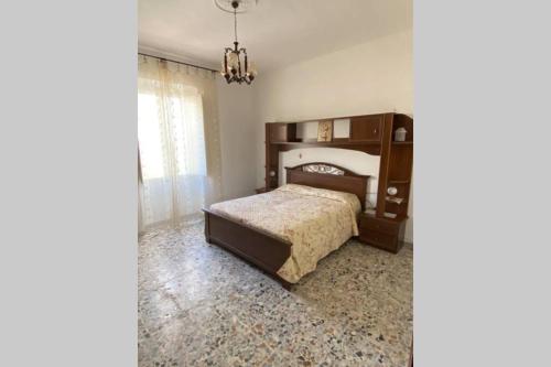 Кровать или кровати в номере Apartment La Paloma in Alghero centre