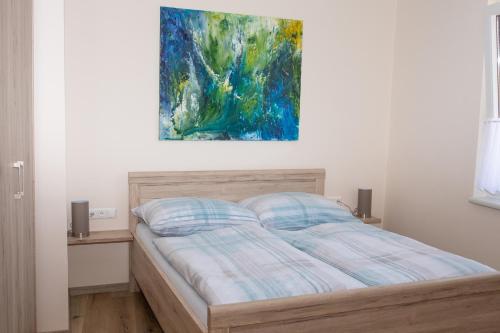 Postel nebo postele na pokoji v ubytování Rebenhof Schwalm