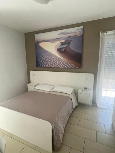 Postel nebo postele na pokoji v ubytování B&B MIRAGE