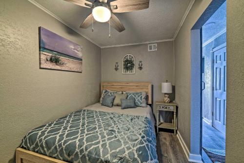 a bedroom with a bed and a ceiling fan at Oceanfront Corpus Christi Condo Resort Perks! in Corpus Christi