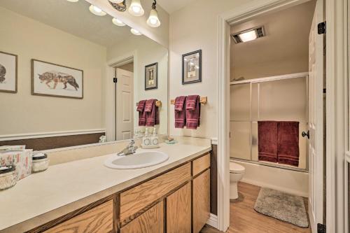 a bathroom with a sink and a toilet at Slopeside Condo with Hot Tub and Game Room Access! in Brian Head