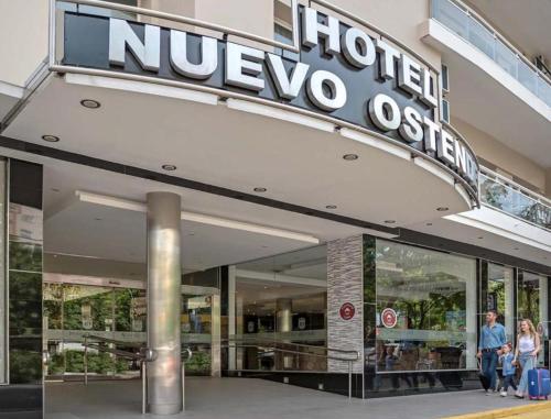 people walking in front of a nocoocoolis store at Hotel Nuevo Ostende by bund in Mar del Plata