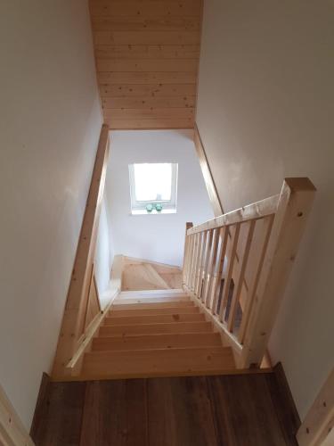 Postel nebo postele na pokoji v ubytování Roubenka Strmá