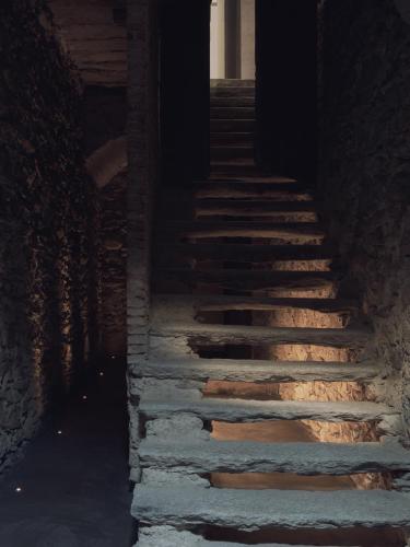 an alley with stone stairs in a building at Agriturismo Olmo in Sondrio