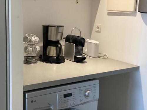 Kuchyň nebo kuchyňský kout v ubytování Studio vue mer Residence Mont Vernon