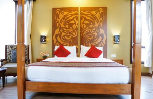 Una cama o camas en una habitación de The Golden Tusk By Ivory Destinations