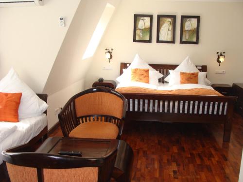 Katil atau katil-katil dalam bilik di Aparthotel Guzulka & Restaurant