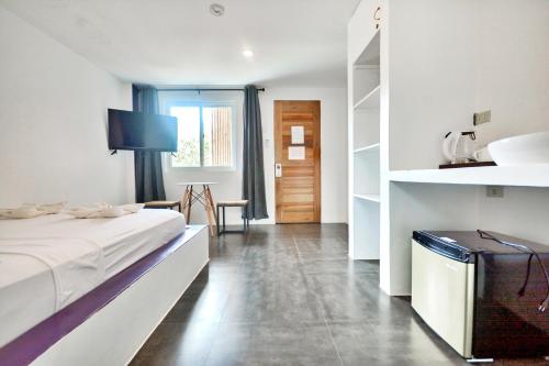 Postel nebo postele na pokoji v ubytování BABOSAM Hotel