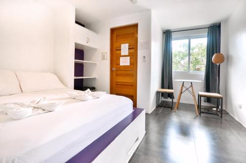 BABOSAM Hotelにあるベッド