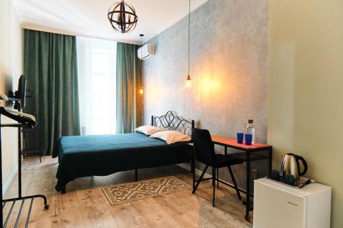 Ένα ή περισσότερα κρεβάτια σε δωμάτιο στο Hi Астана