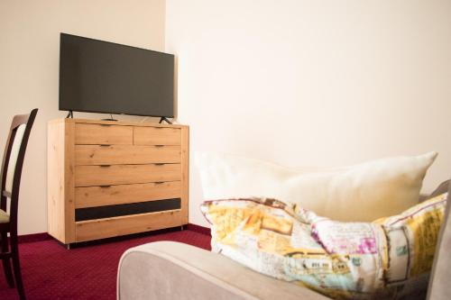 Μια τηλεόραση ή/και κέντρο ψυχαγωγίας στο P4W Hotel Residence Szombathely