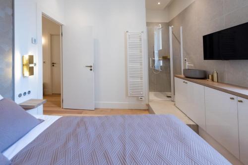 Ένα ή περισσότερα κρεβάτια σε δωμάτιο στο Luxury Apartment - Heart of Cannes - Rue d'Antibes