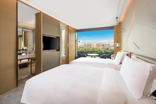 Ένα ή περισσότερα κρεβάτια σε δωμάτιο στο InterContinental Taiyuan by IHG