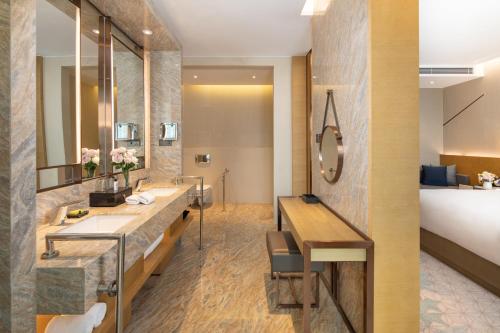 Ένα ή περισσότερα κρεβάτια σε δωμάτιο στο InterContinental Taiyuan by IHG