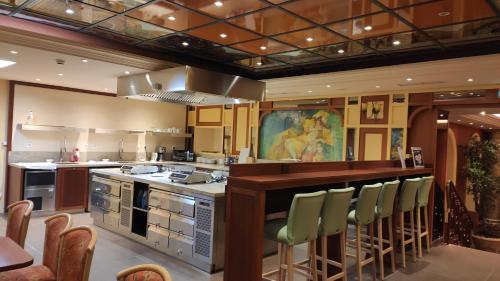 Kuchyň nebo kuchyňský kout v ubytování Residence Share Inn