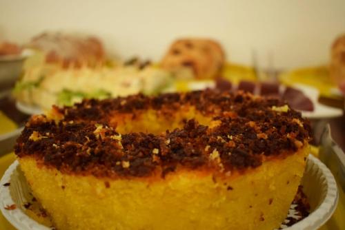 a close up of a piece of pie on a plate at Pousada Pé da Serra in Lindóia