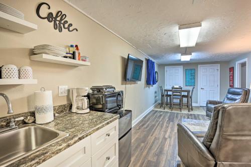 a kitchen with a sink and a counter top at Walk to Main St Sturgis Apt with Grill! in Sturgis