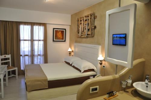 Gallery image of Vrahos Boutique Hotel in Karavostasi