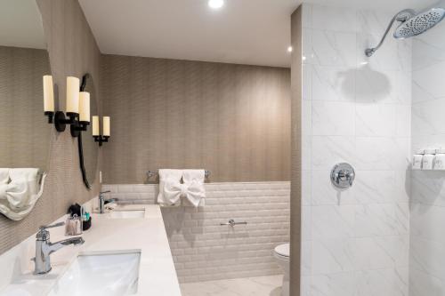 a bathroom with a shower and a sink and a toilet at The Inn on Pine in Calistoga