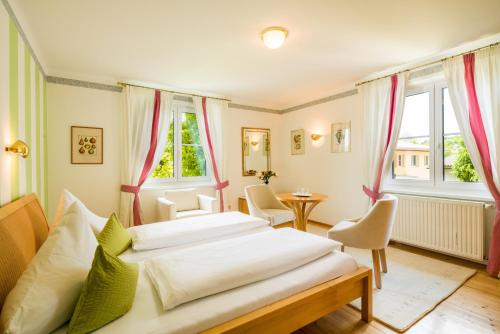 Ένα ή περισσότερα κρεβάτια σε δωμάτιο στο Villa Konstanze