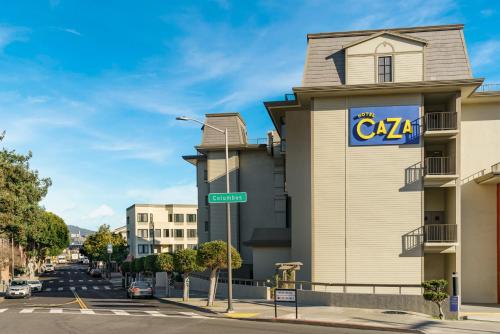 a building with a caa sign on the side of it at Hotel Caza Fisherman's Wharf in San Francisco