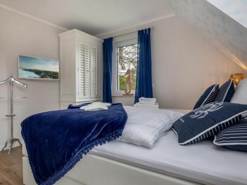 Ένα ή περισσότερα κρεβάτια σε δωμάτιο στο Haus Nordlicht