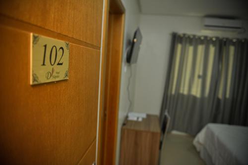 Katil atau katil-katil dalam bilik di Hotel D'Nápoles