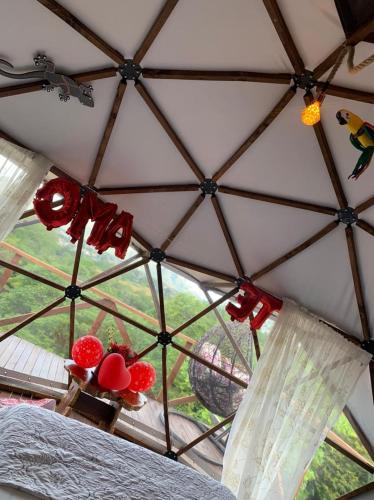 a view of a room with a glass ceiling at Eco-Glamping Shalom in Mariquita