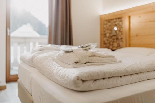 Postel nebo postele na pokoji v ubytování Hotel Aurai