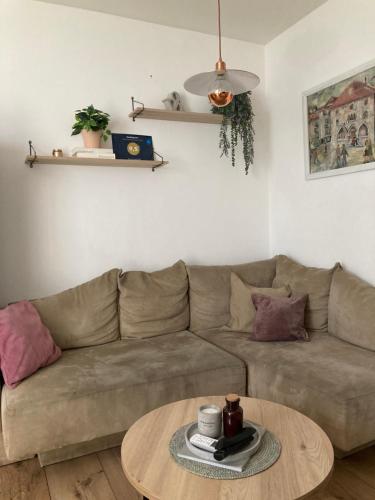 a living room with a couch and a table at Apartment Ria in Split