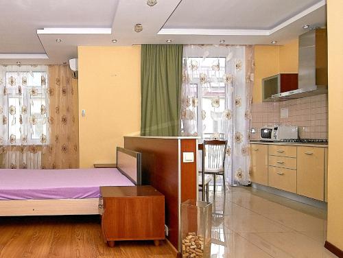 Η κουζίνα ή μικρή κουζίνα στο Inn Home Apartments-Olimpiysky Stadium area