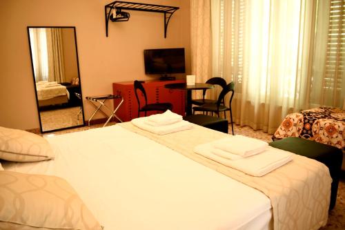 Postel nebo postele na pokoji v ubytování Due Cani