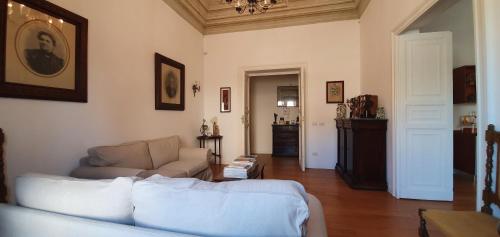 A bed or beds in a room at Il Cortile del Marchese Beccadelli