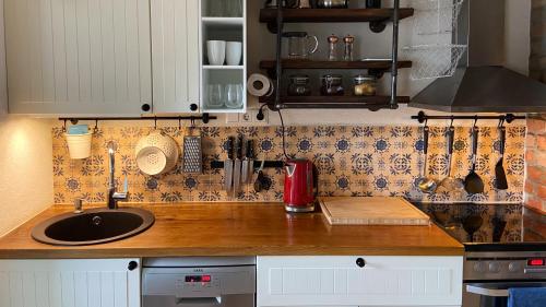 Dapur atau dapur kecil di Pāvilostas Šīfermāja