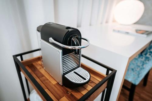 a phone sitting on top of a table at Abbate Boutique Hotel in Ulm