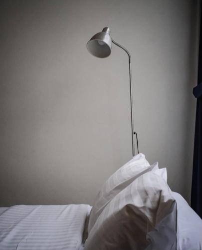 Ένα ή περισσότερα κρεβάτια σε δωμάτιο στο Arthit -Tara Lodge
