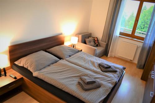Posteľ alebo postele v izbe v ubytovaní NEW Apartment 120 Residence