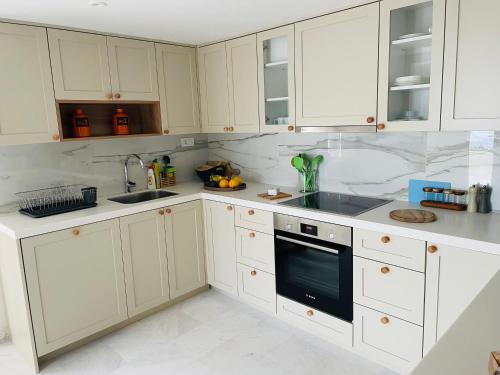 Dapur atau dapur kecil di Villa Portico