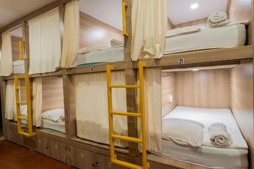 Cama o camas de una habitación en Hostel the pod 33