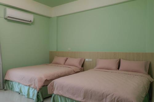 Cama o camas de una habitación en Zhiyue Homestay