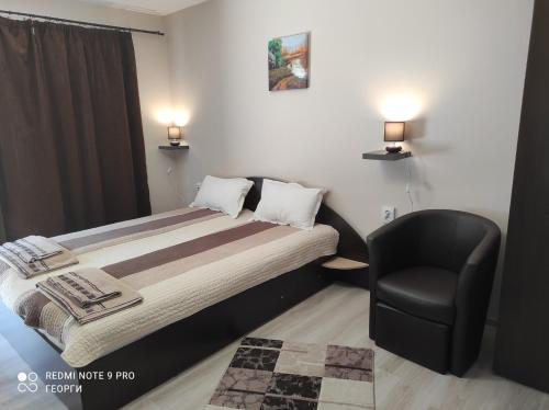 En eller flere senge i et værelse på Vila Rila