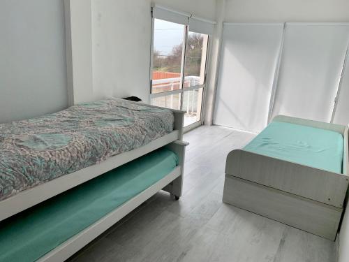 Кровать или кровати в номере BRISAS DEL MAR