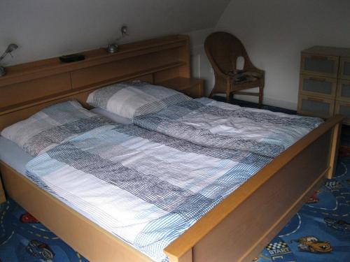 Llit o llits en una habitació de Ferienwohnung ULLABRU