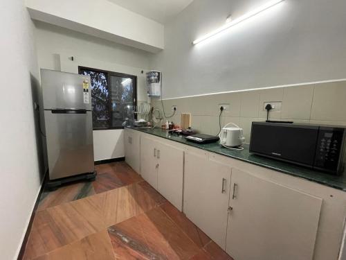 Köök või kööginurk majutusasutuses Eness Hostels Pondicherry