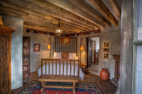 Cama o camas de una habitación en Hacienda Las Amantes